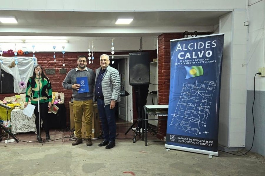 El senador Alcides Calvo junto al presidente comunal Luciano Milanesio